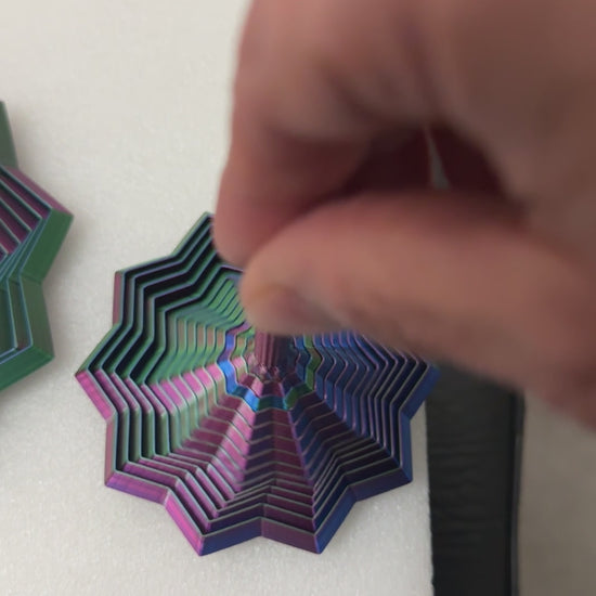 Video of playing with the 3D printed star fidget toy with a handle